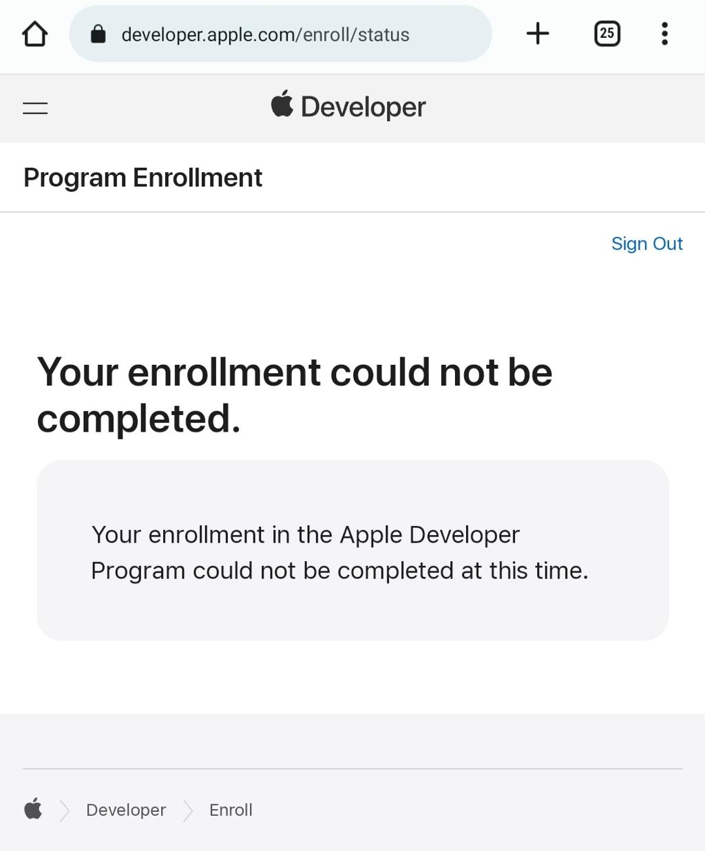 Mobile view of the Apple Developer enrollment status page showing the same error